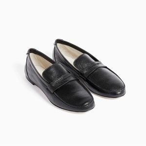 Beautiful black penny loafer. Nearly New. Worn a couple of times .